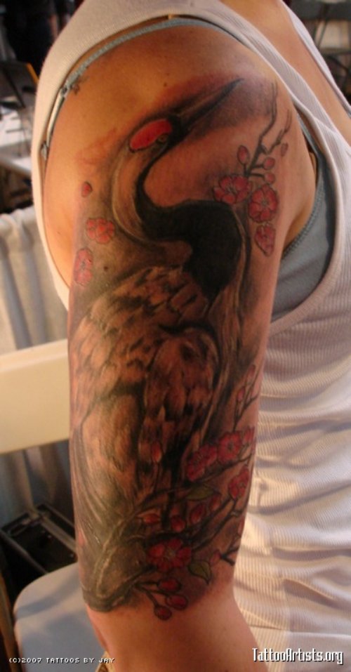 Amazing Crane Tattoo On Man Right Half Sleeve