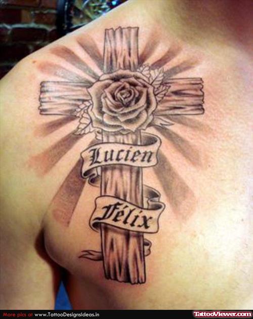Grey Ink Cross And Rose Flower Tattoo On Shoulder