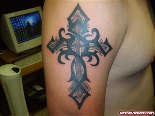 Cross And Black Tribal Tattoo On Half Sleeve