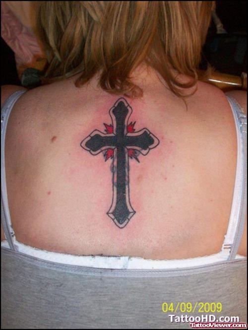 Black Ink Cross Tattoo On Upperback