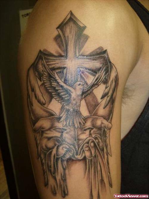 Grey Ink Winged Cross And Flying Dove In Hands Tattoo On Half Sleeve