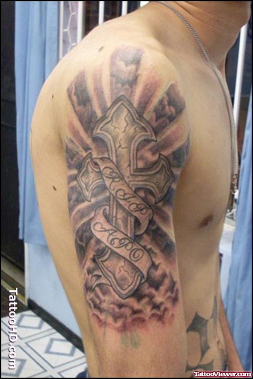 Cross With Rip Banner Tattoo On Half Sleeve