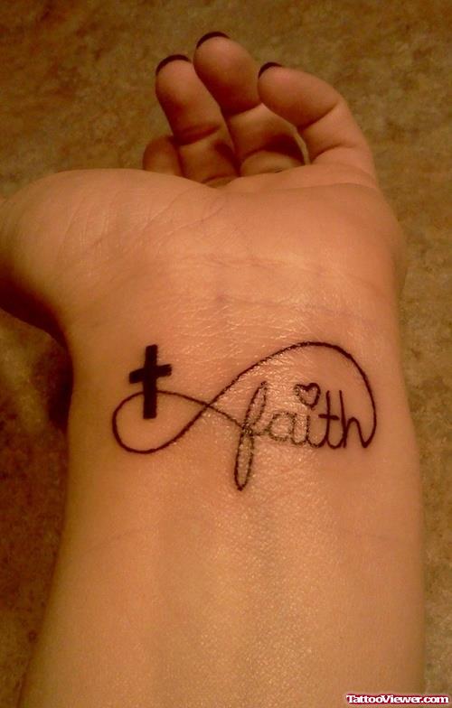 Black Cross And Faith Infinity Symbol Tattoo On Wrist