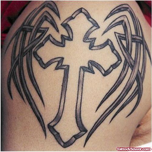 Tribal Winged Cross Tattoo On Right Shoulder