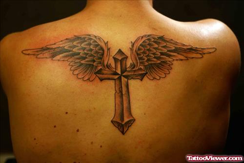 Cross Winged Grey Ink Tattoo On Back