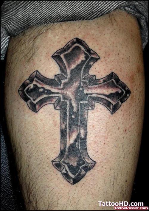 Catholic Cross Grey Ink Tattoo On Back Leg