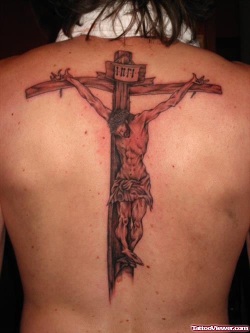 Jesus On Cross Grey Ink Tattoo On Back Body