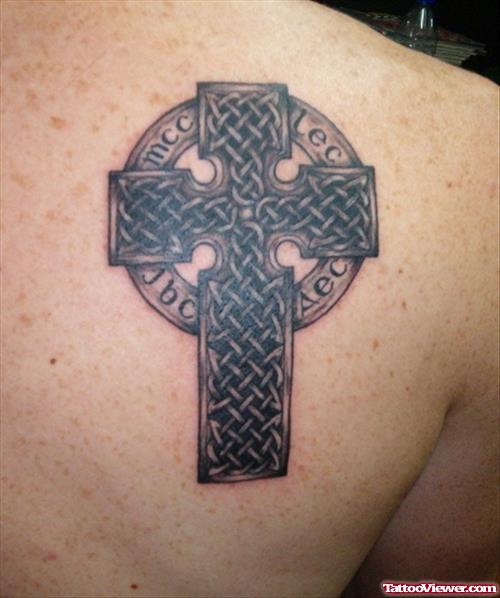 Grey Ink Celtic Cross Tattoo On Right Back Shoulder