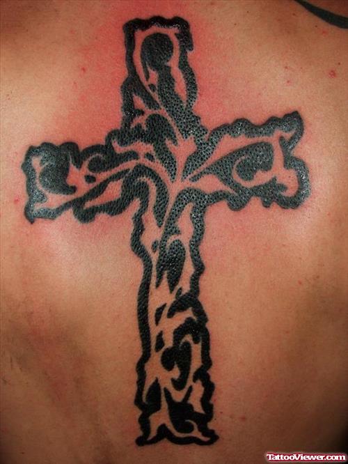 Black Ink Tribal Cross Tattoo On Back