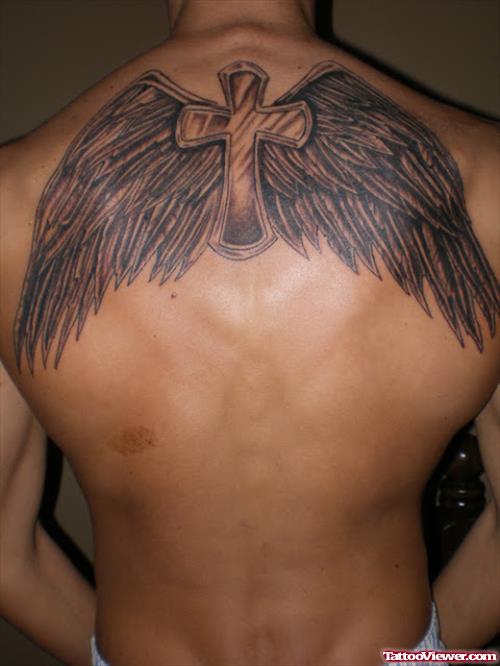 Awesome Winged Cross Tattoo On Man Upperback