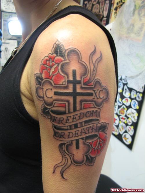 Large Cross With Fredom Or Death Banner With Rose Flowers Tattoo