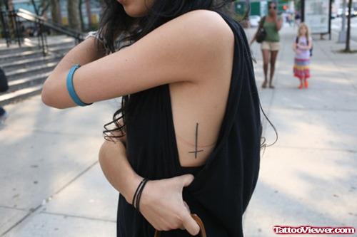 Girl With Cross Tattoo On Left Side Rib