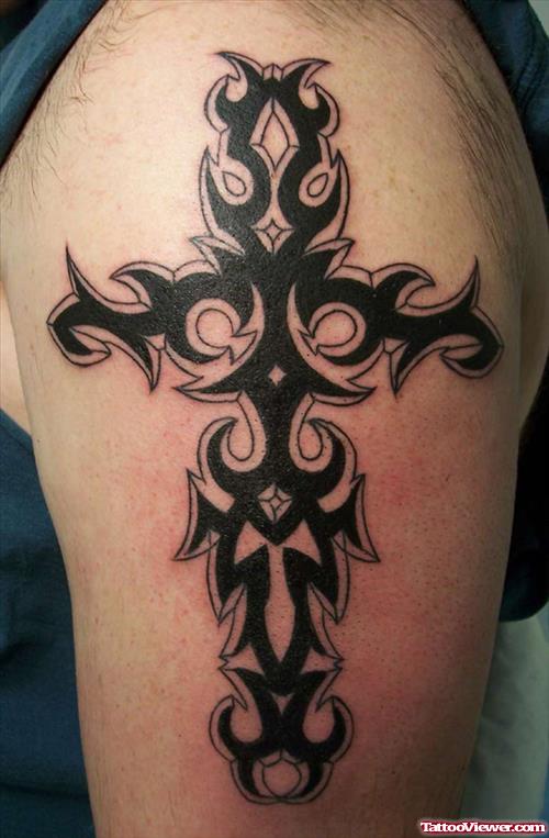 Black Ink Tribal Cross Tattoo On Left Half Sleeve