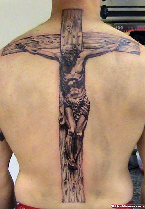 Awesome Large Grey Ink Cross Tattoo On Back Body