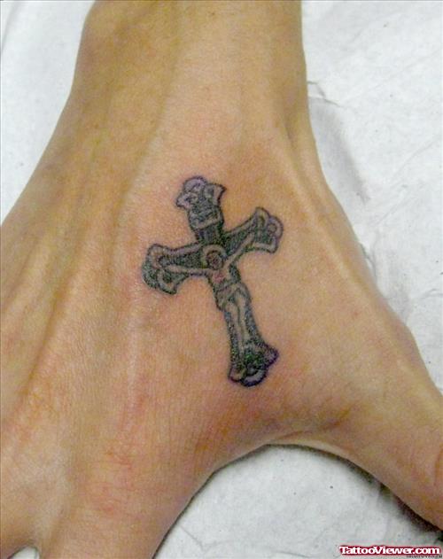 Grey Ink Religious Cross Tattoo On Right Hand