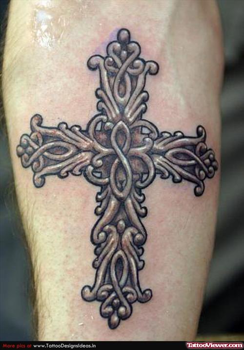 Grey Ink Cross Tattoo On Right Arm