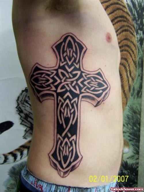 Celtic Cross Tattoo On Man Side Rib