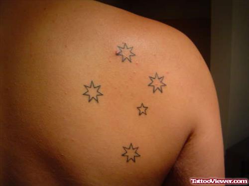 Stars Cross Tattoo On Right Back Shoulder