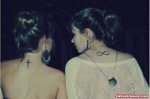 Cross And Infinity Symbol Tattoos On Back