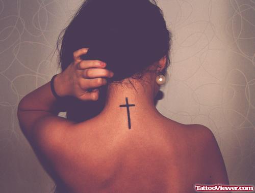Girl With Cross Tattoo On Back Neck