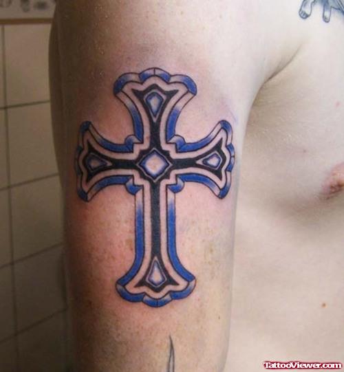 Cross And Blue Ink Tattoo On Right Half Sleeve