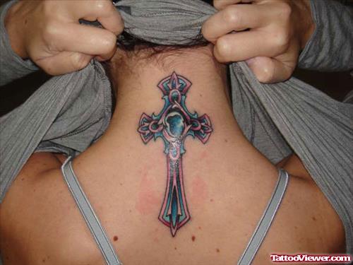 Amazing Cross Tattoo On Girl Upperback