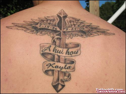 Memorial Winged Cross Tattoo On Upperback