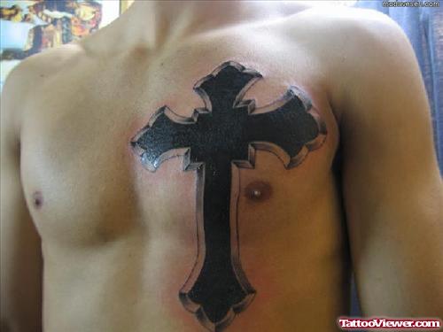 Black Ink Cross Tattoo On Man Chest