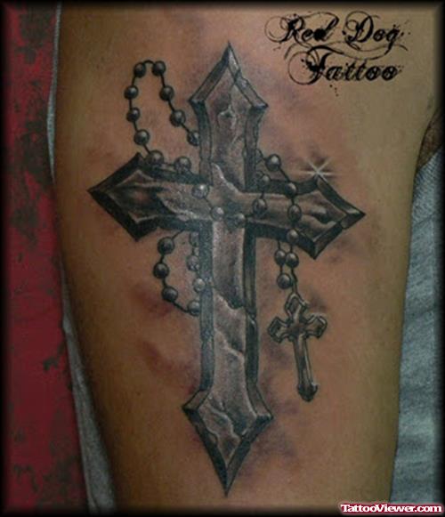 Grey Ink Cross And Rosary Tattoo On Half Sleeve