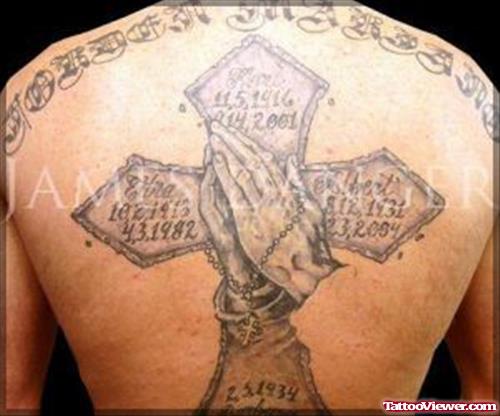 Large Cross and Praying Hands Grey Ink Tattoo On Back