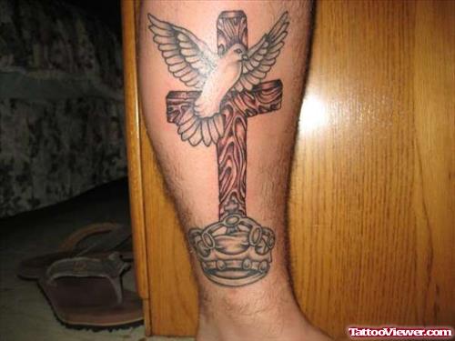 Flying Dove And Cross Tattoo On Leg