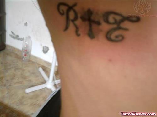 R E Cross Tattoo