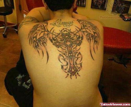 Winged Tribal Cross Tattoo On Back