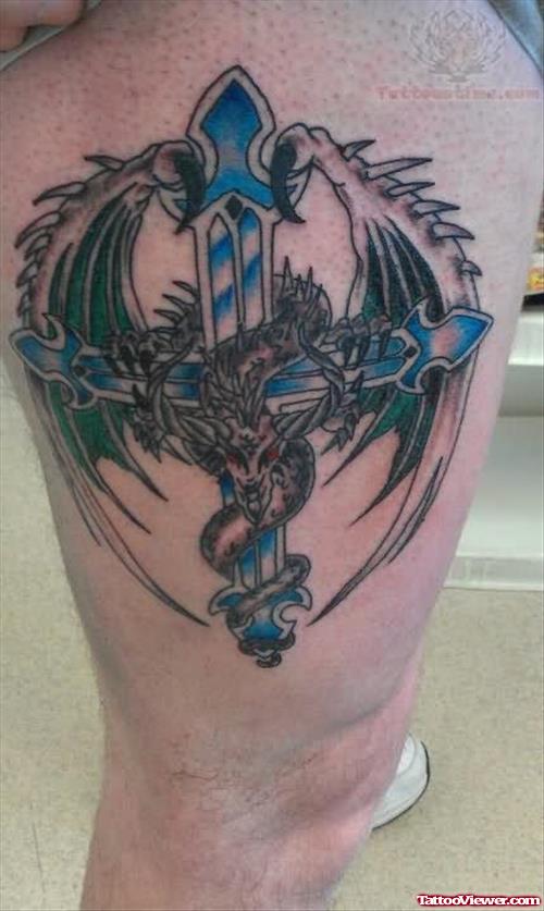 Winged Cross Tattoo On Thigh