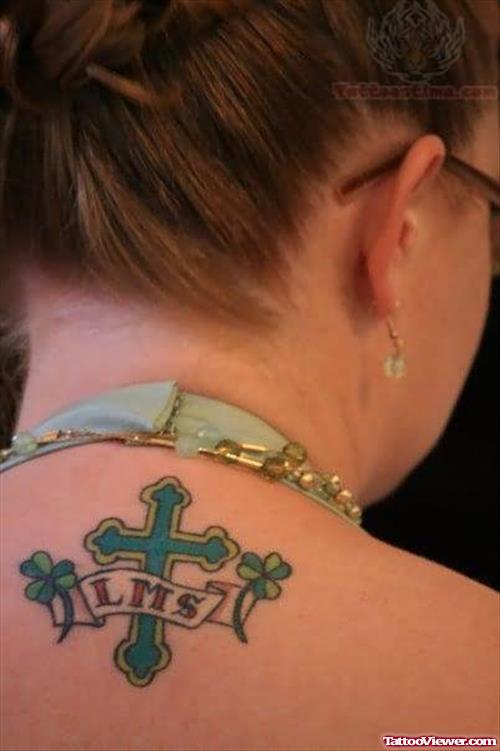 Green ink Cross And Lms Banner Tattoo On Back