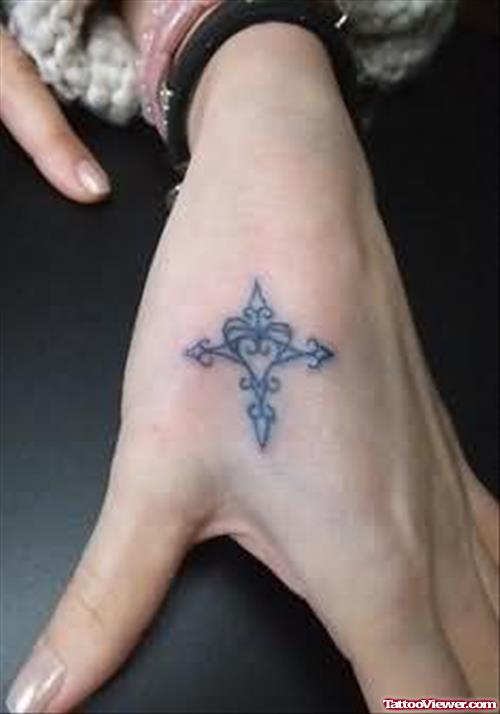 Tiny Cross Tattoo