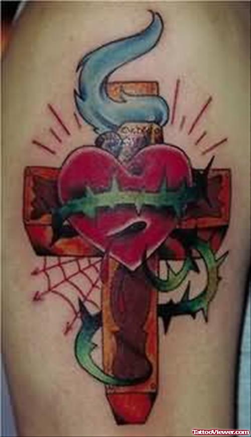 Colorful Cross Tattoo On Bicep
