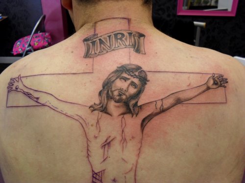 Grey Ink Jesus Cross Tattoo On Upperback