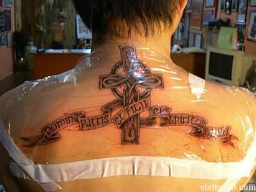 Banners And Cross Tattoo On Upperback