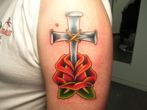 Red Rose And Nails Cross Tattoo On Left Shoulder