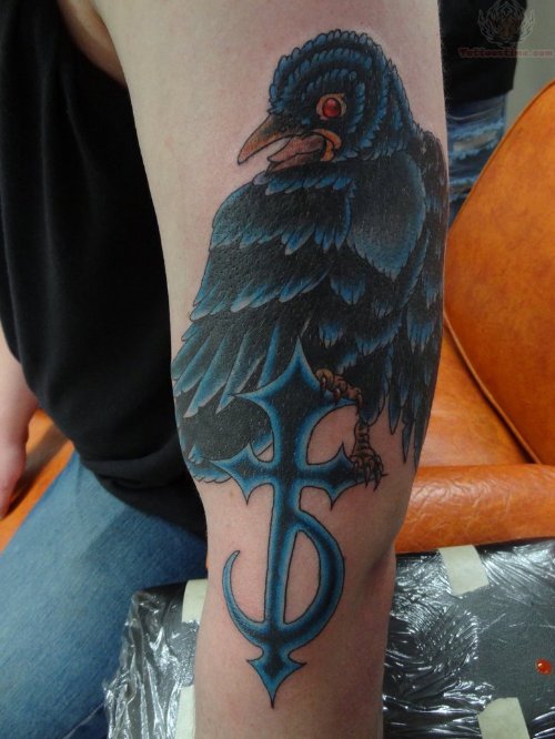 Crow And Cross Tattoo On Arm