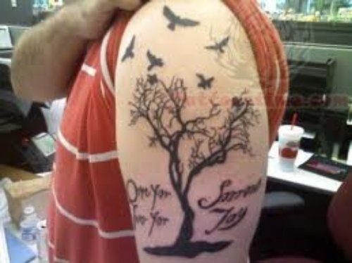 Flying Crows And Tree Tattoo On Bicep