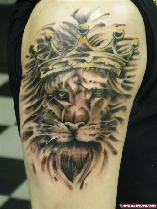 Lion Crown Tattoo On Muscles