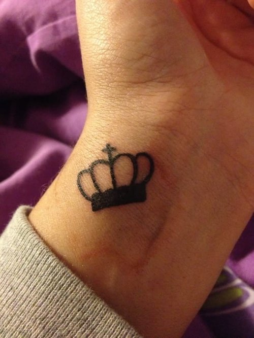 Black Crown Tattoo On Girl Wrist