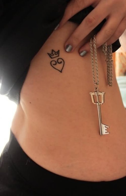 Small Heart Crown Tattoo On Ribcage