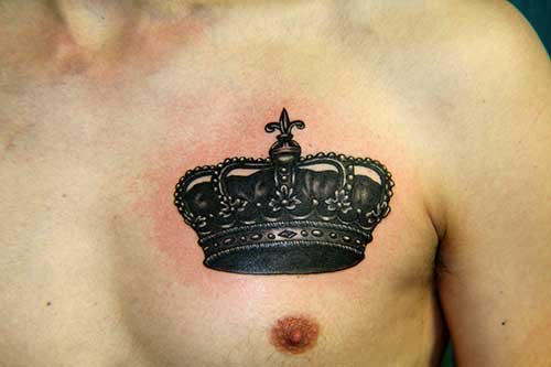 Black Ink King Crown Tattoo On Man Chest