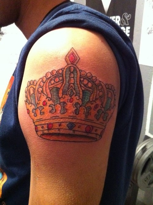 Colorful Crown Tattoo On Left Shoulder