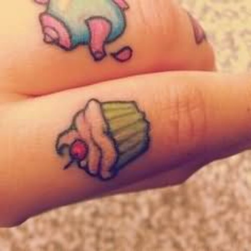 Tea Cattle And Cupcake Tattoos on Fingers