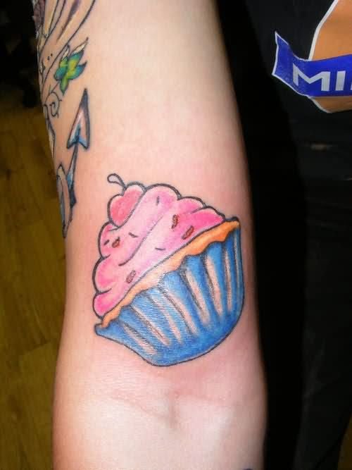Cupcake Tattoo On Right Bicep