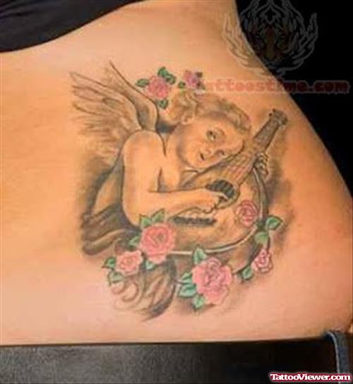 Cupid Cherub Tattoo On Lower Back